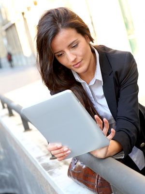 woman-tablet-outside