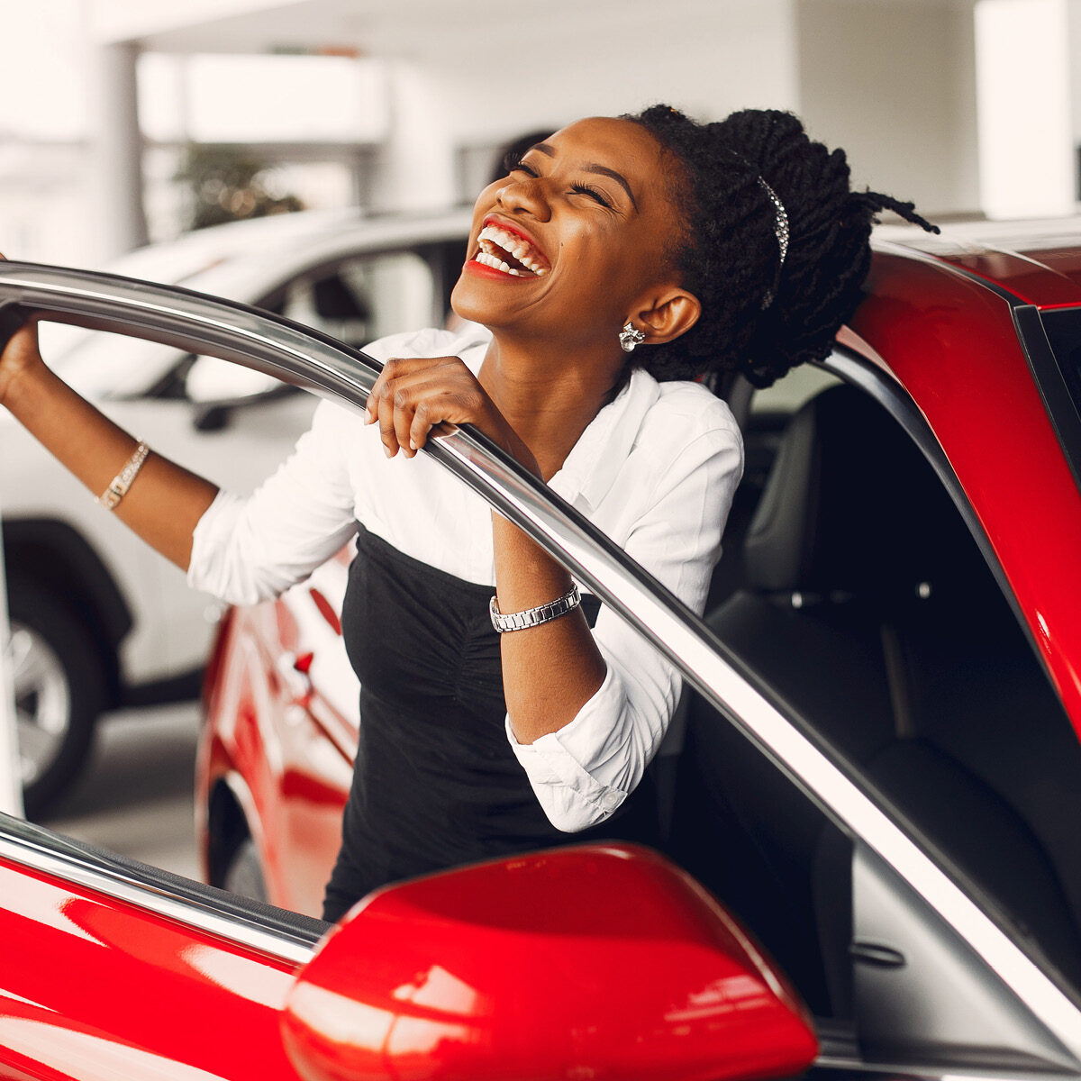 Happy Woman with a new car
