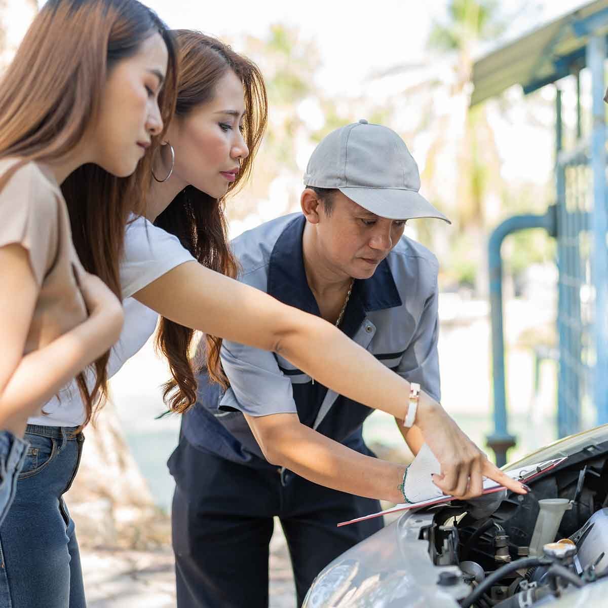Man-Fixing-Car